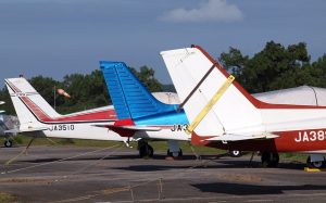 Tail of several airplanes